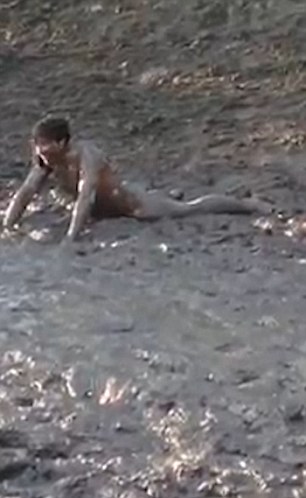 chris labus add men naked in mud photo