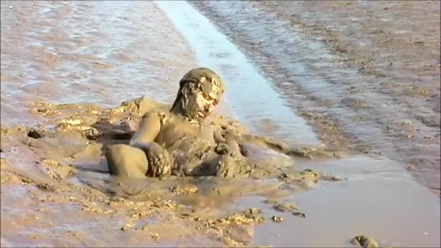 charlie villasis add men naked in mud image