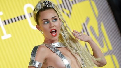 cindy cavender add miley cyrus naked on stage photo